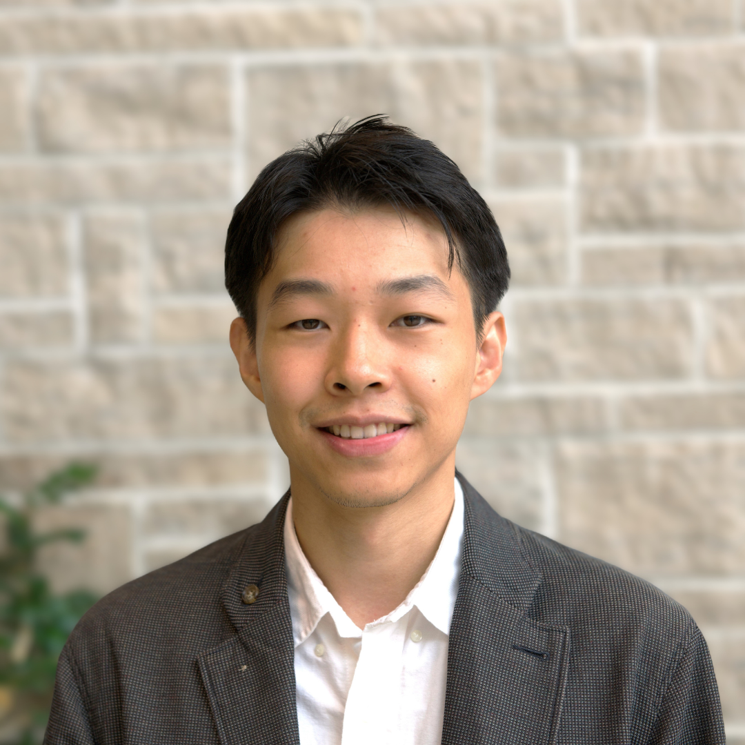 Headshot of Shuai Ren, smiling.