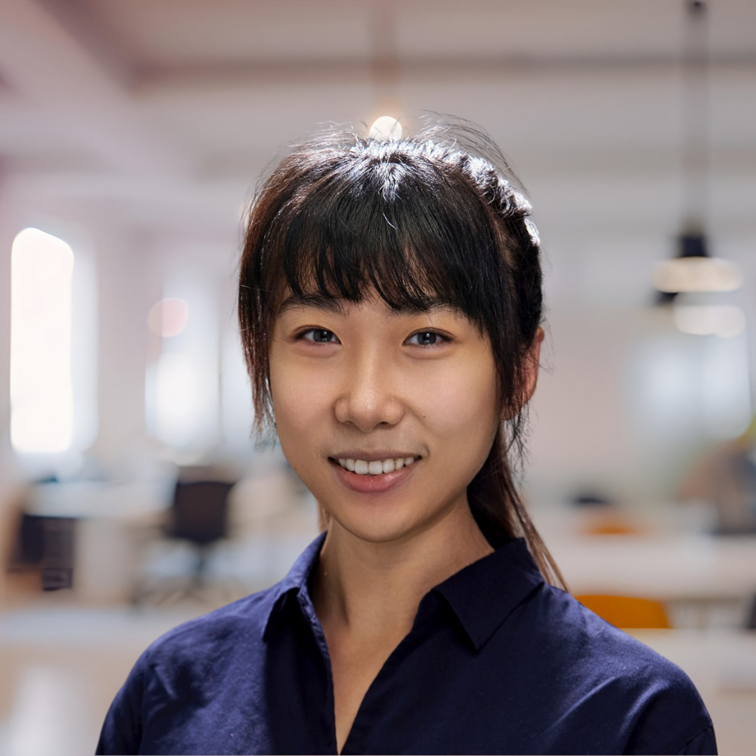 Headshot of Skylar (Xinyu) Wang, smiling.