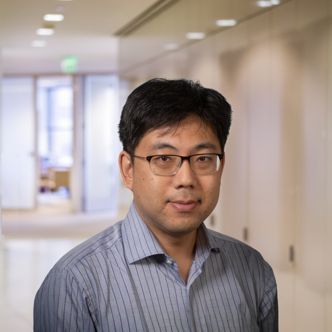 Headshot of Yoontae Jeon, a smiling man with short, dark hair, glasses, wearing a striped shirt.